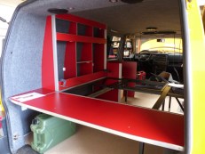 Bed frame and surrounding cupboards going in