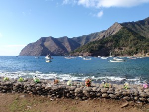 An elegant memorial to those who were klled in the tsunami, flowers for each victim along the front of the bay