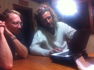 Bruce and Romain consider the next day's weather forecast